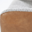 Fauteuil avec accoudoirs en tissu et simili et pieds étoile DILIS